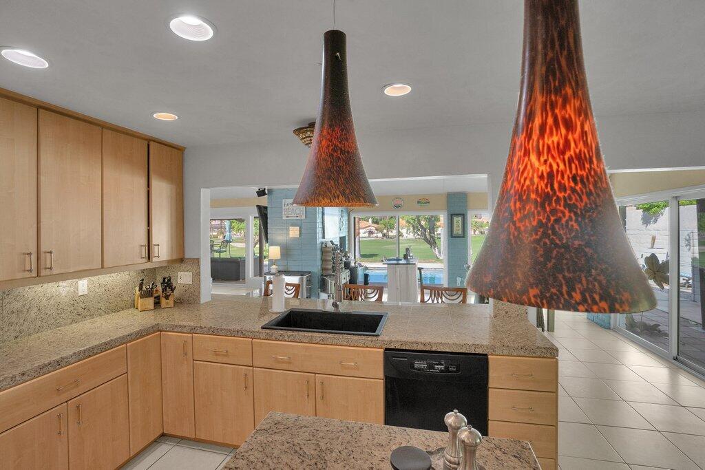 43761 Port Maria Road Bermuda Dunes, CA 92203 - Photo 24 of 50 a kitchen with a sink and a large window