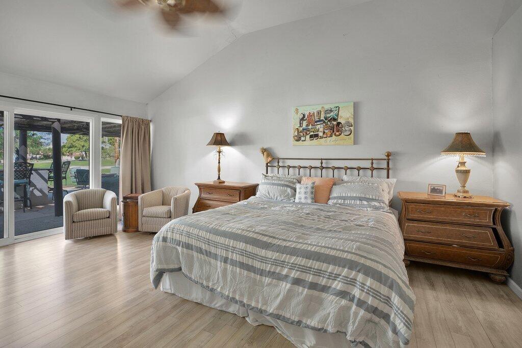 43761 Port Maria Road Bermuda Dunes, CA 92203 - Photo 27 of 50 a bedroom with a bed and a couch
