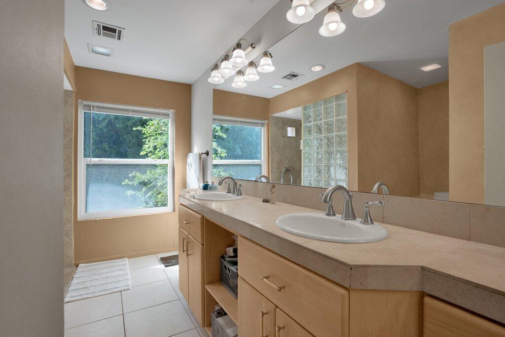 43761 Port Maria Road Bermuda Dunes, CA 92203 - Photo 29 of 50 a bathroom with a sink double vanity and a mirror