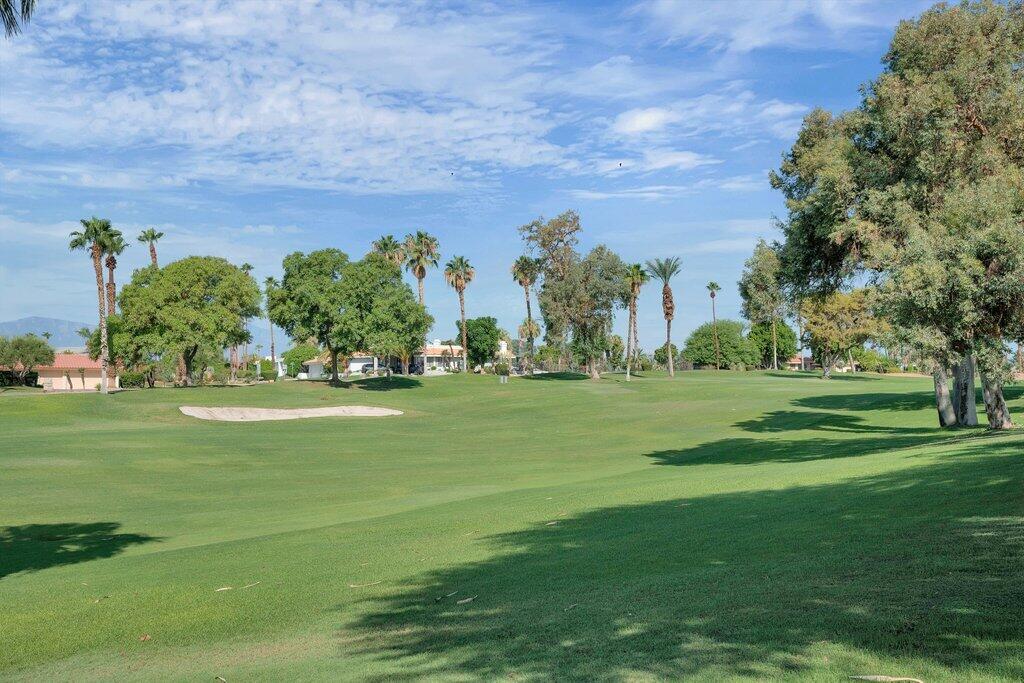 43761 Port Maria Road Bermuda Dunes, CA 92203 - Photo 38 of 50 a yard with lots of green space and trees