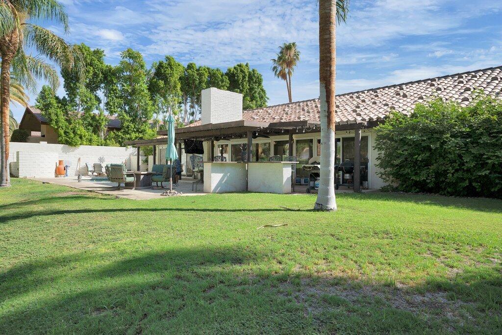 43761 Port Maria Road Bermuda Dunes, CA 92203 - Photo 39 of 50 a view of a house with a yard