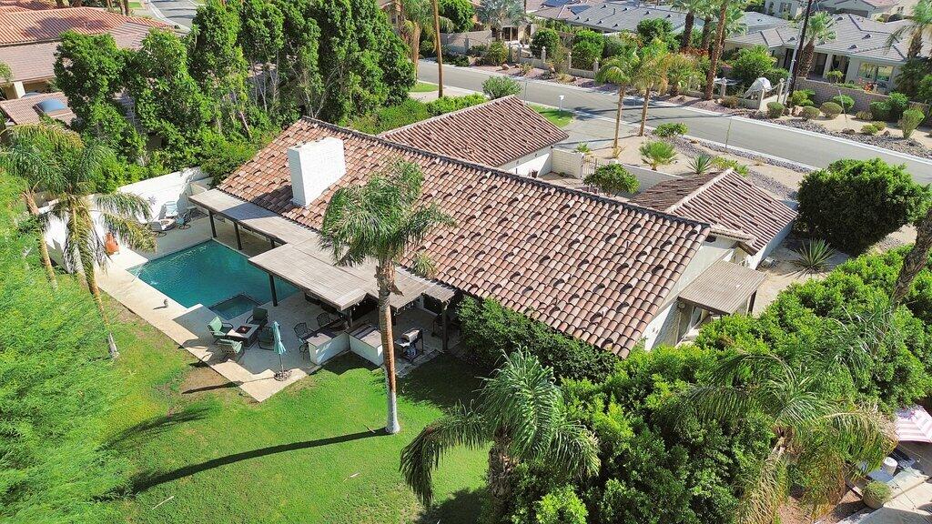 43761 Port Maria Road Bermuda Dunes, CA 92203 - Photo 45 of 50 an aerial view of a house with swimming pool and outdoor seating
