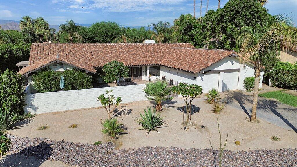 43761 Port Maria Road Bermuda Dunes, CA 92203 - Photo 7 of 50 a view of a house with a yard