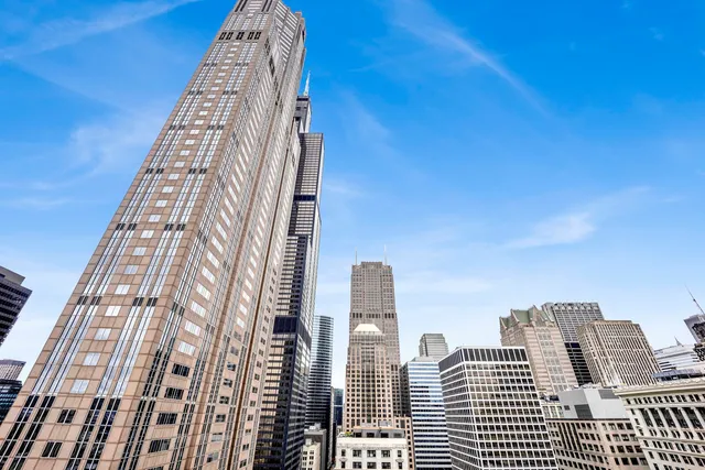 a view of a city with tall buildings