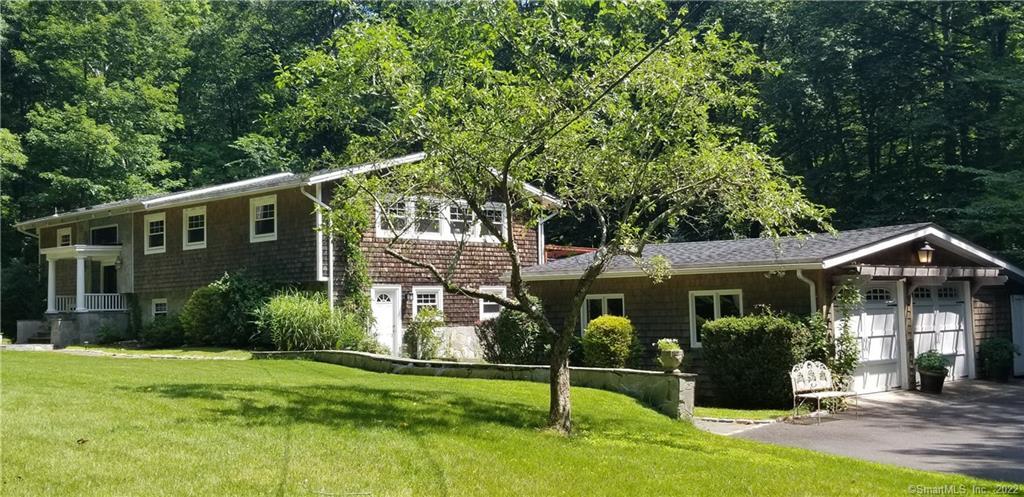 64 Musket Ridge Road Wilton, CT 06897 - Photo 1 of 1 Picturesque home and detached garage, set deep on nature lover's property.