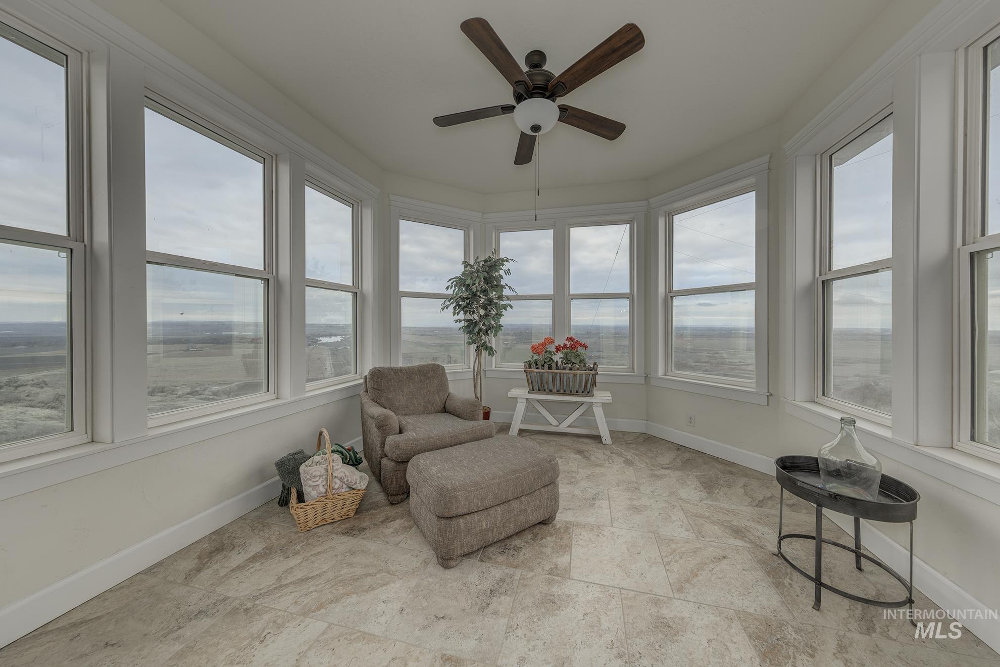 5631 Sunset Road Fruitland, ID 83619 - Photo 17 of 50 Sunroom with plenty of natural light
