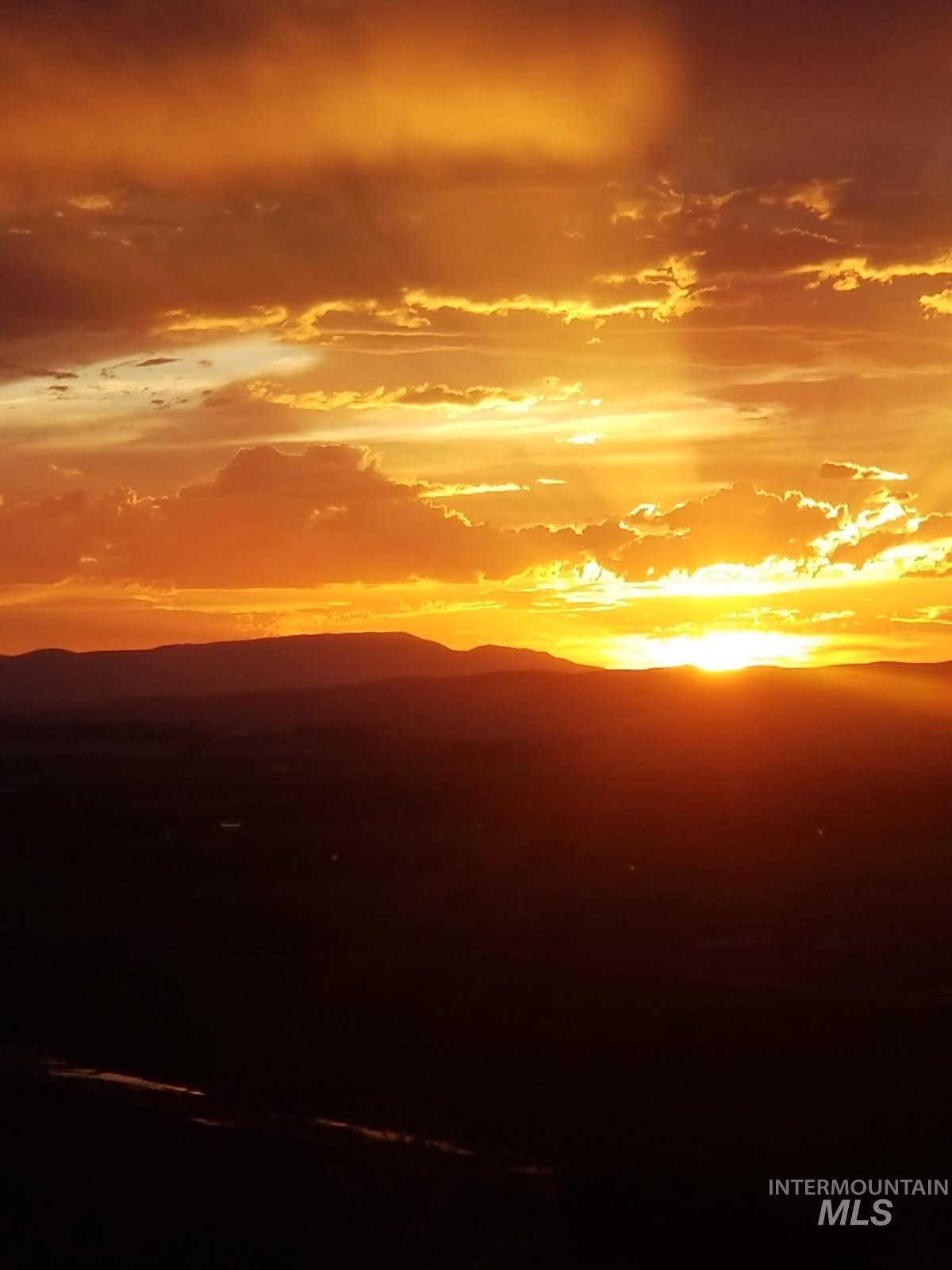 5631 Sunset Road Fruitland, ID 83619 - Photo 5 of 50 Water view featuring a mountain backdrop