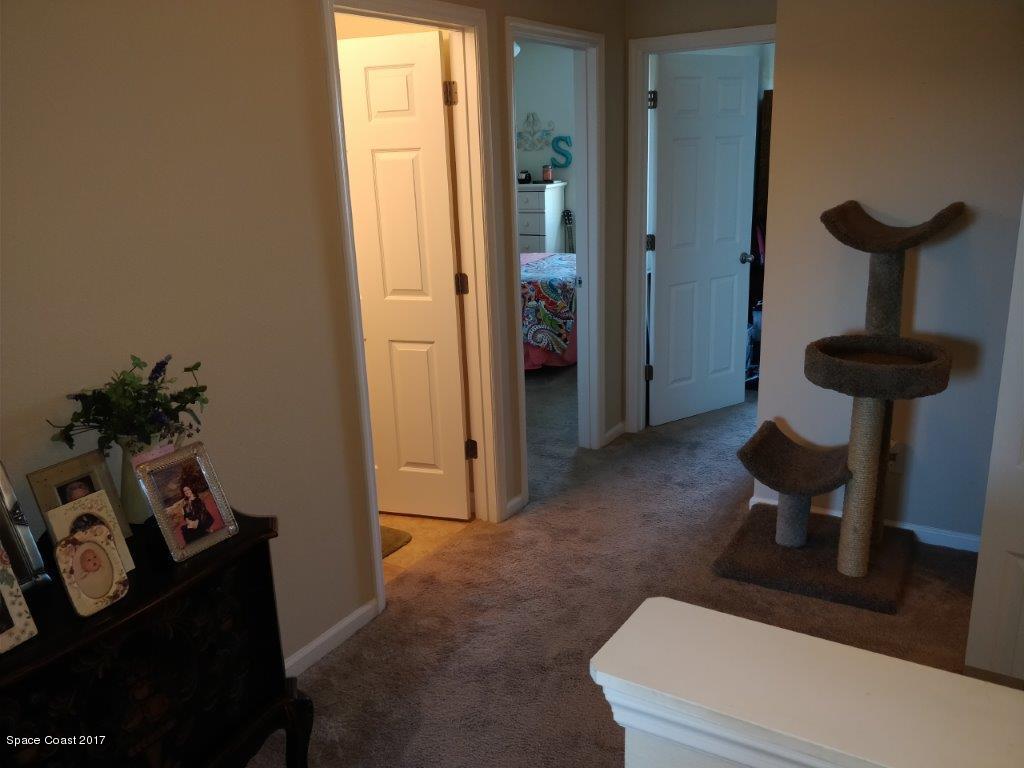 2790 Reston Street, Unit 104 Melbourne, FL 32935 - Photo 17 of 30 a living room with furniture and a window