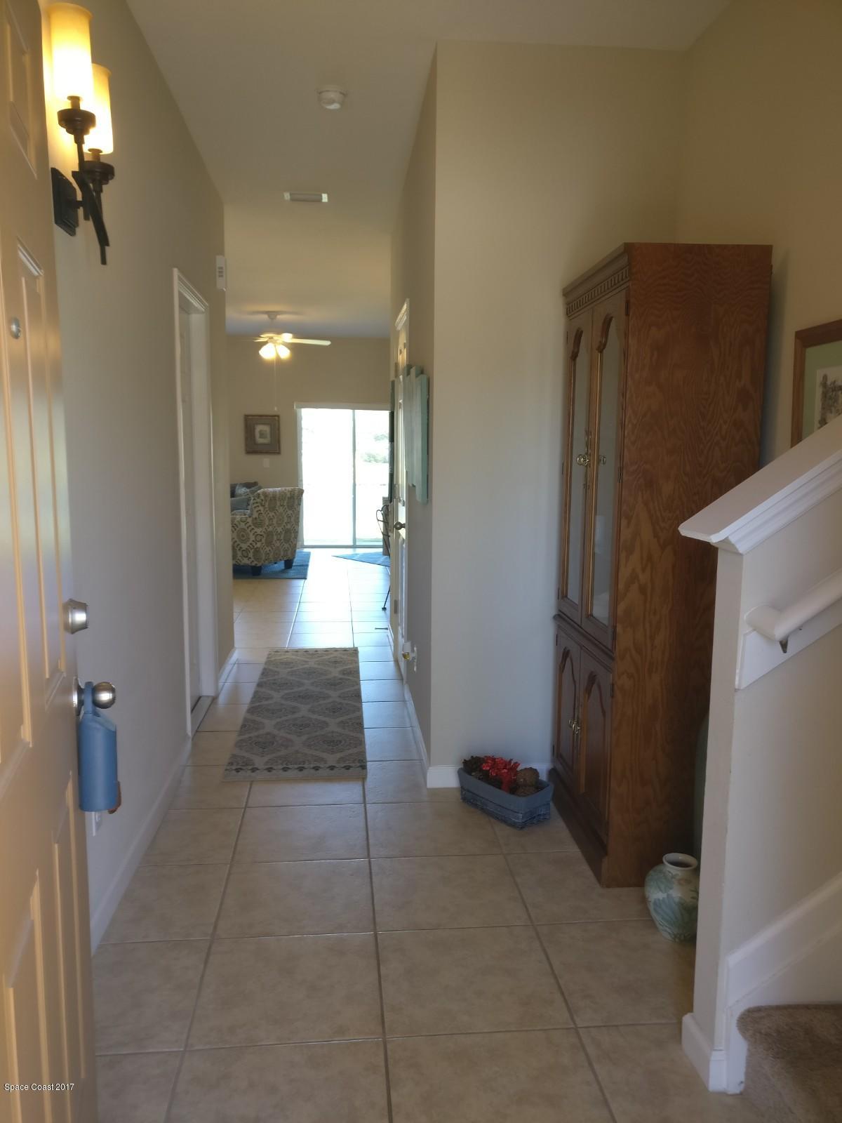 2790 Reston Street, Unit 104 Melbourne, FL 32935 - Photo 19 of 30 a bathroom with a shower and a toilet