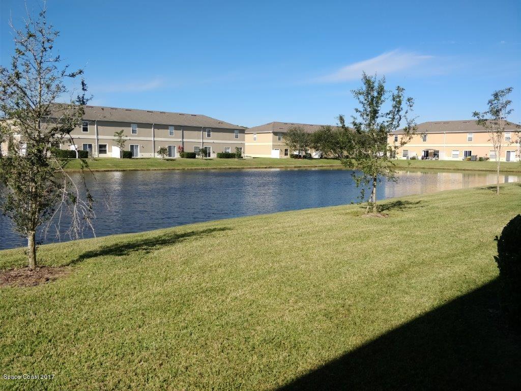 2790 Reston Street, Unit 104 Melbourne, FL 32935 - Photo 5 of 30 a view of swimming pool with an ocean view