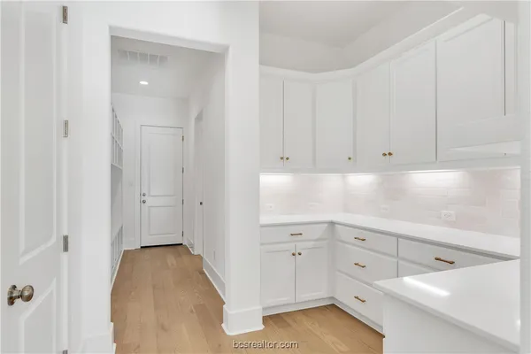 a bathroom with a sink and a bathtub