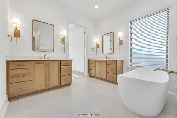 a bathroom with a sink a toilet and a bathtub