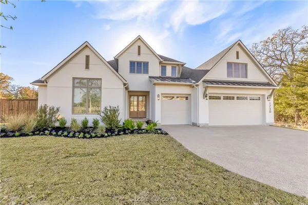 a view of wooden floor and windows in a room