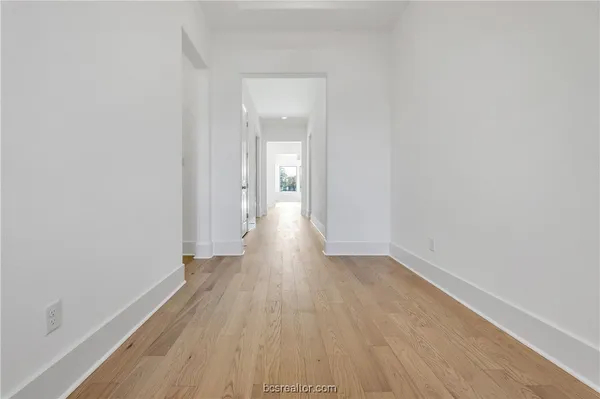 a large kitchen with a large window