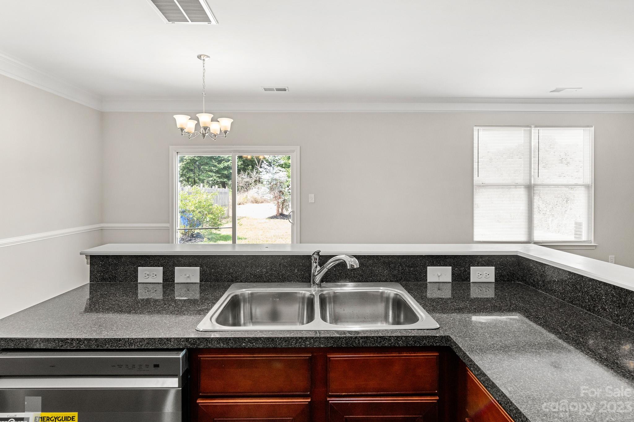 3808 Herkimer Drive Monroe, NC 28110 - Photo 15 of 40 a kitchen that has a sink and a window