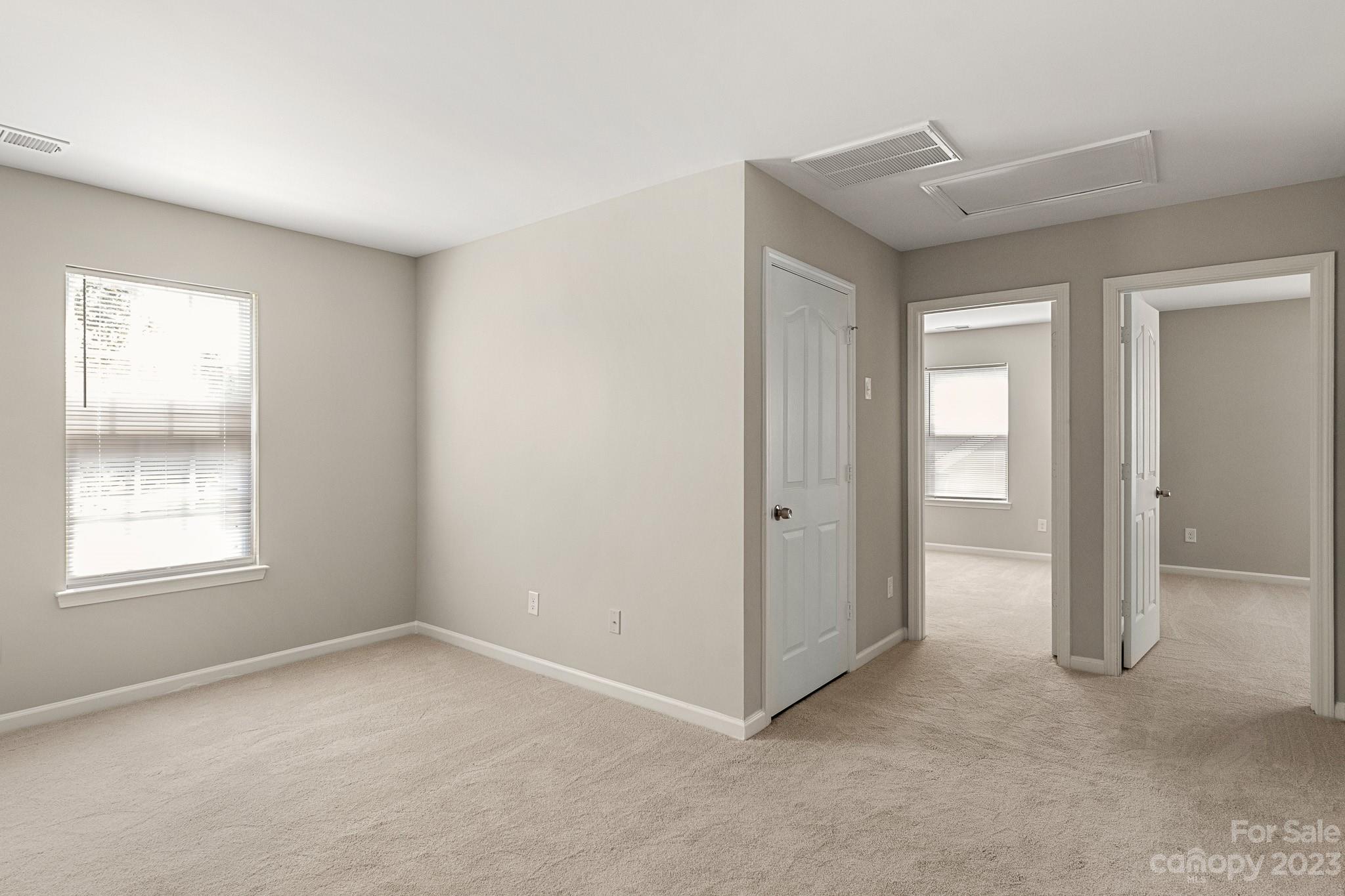 3808 Herkimer Drive Monroe, NC 28110 - Photo 20 of 40 an empty room with windows and closet