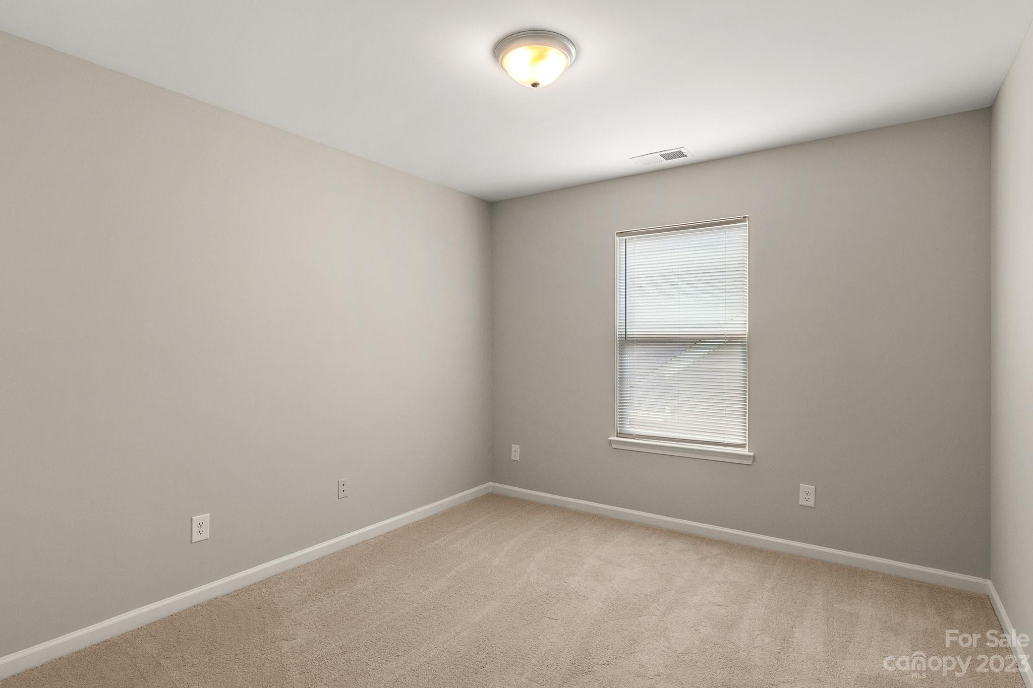 3808 Herkimer Drive Monroe, NC 28110 - Photo 23 of 40 an empty room with a window