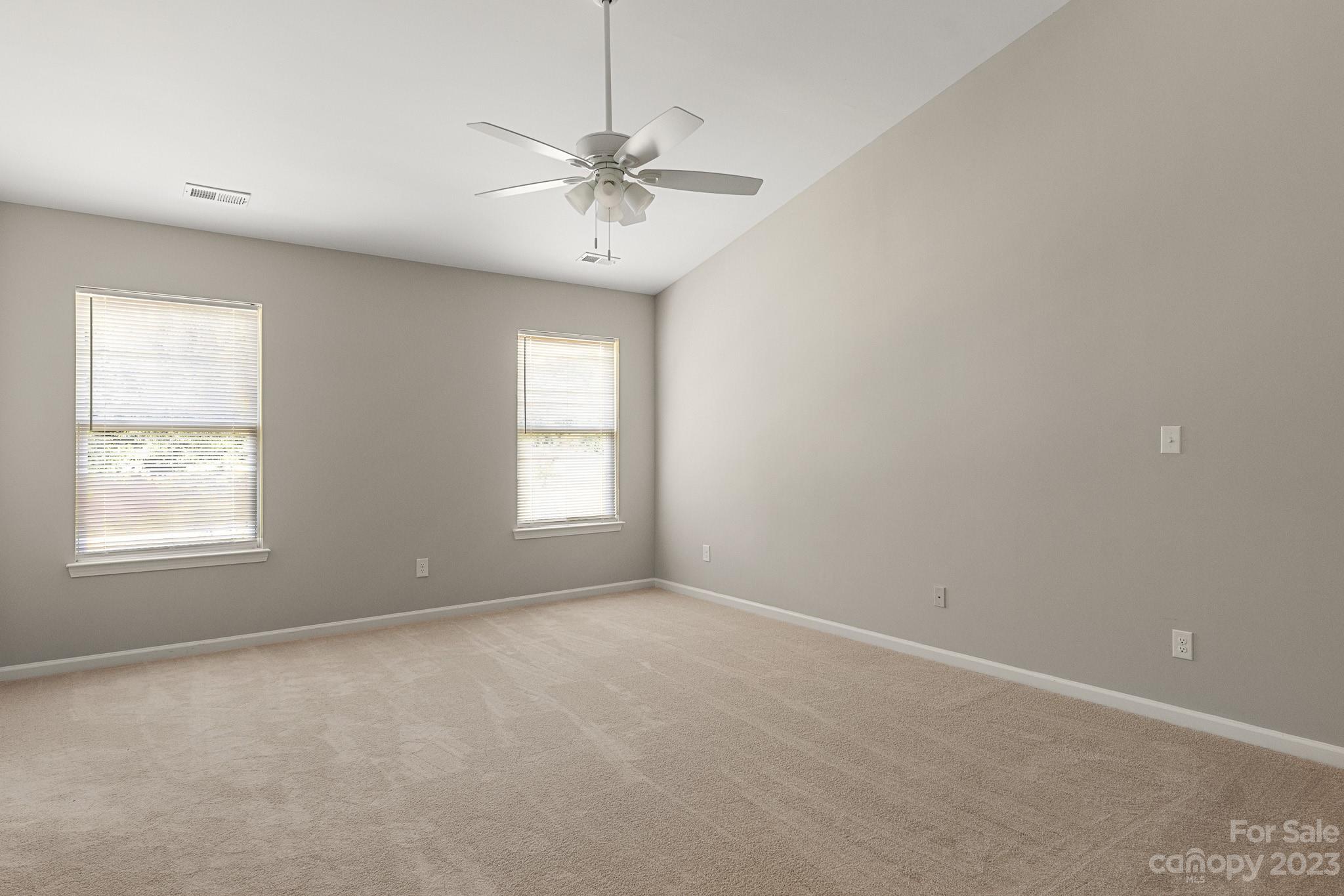 3808 Herkimer Drive Monroe, NC 28110 - Photo 27 of 40 an empty room with a window and a fan