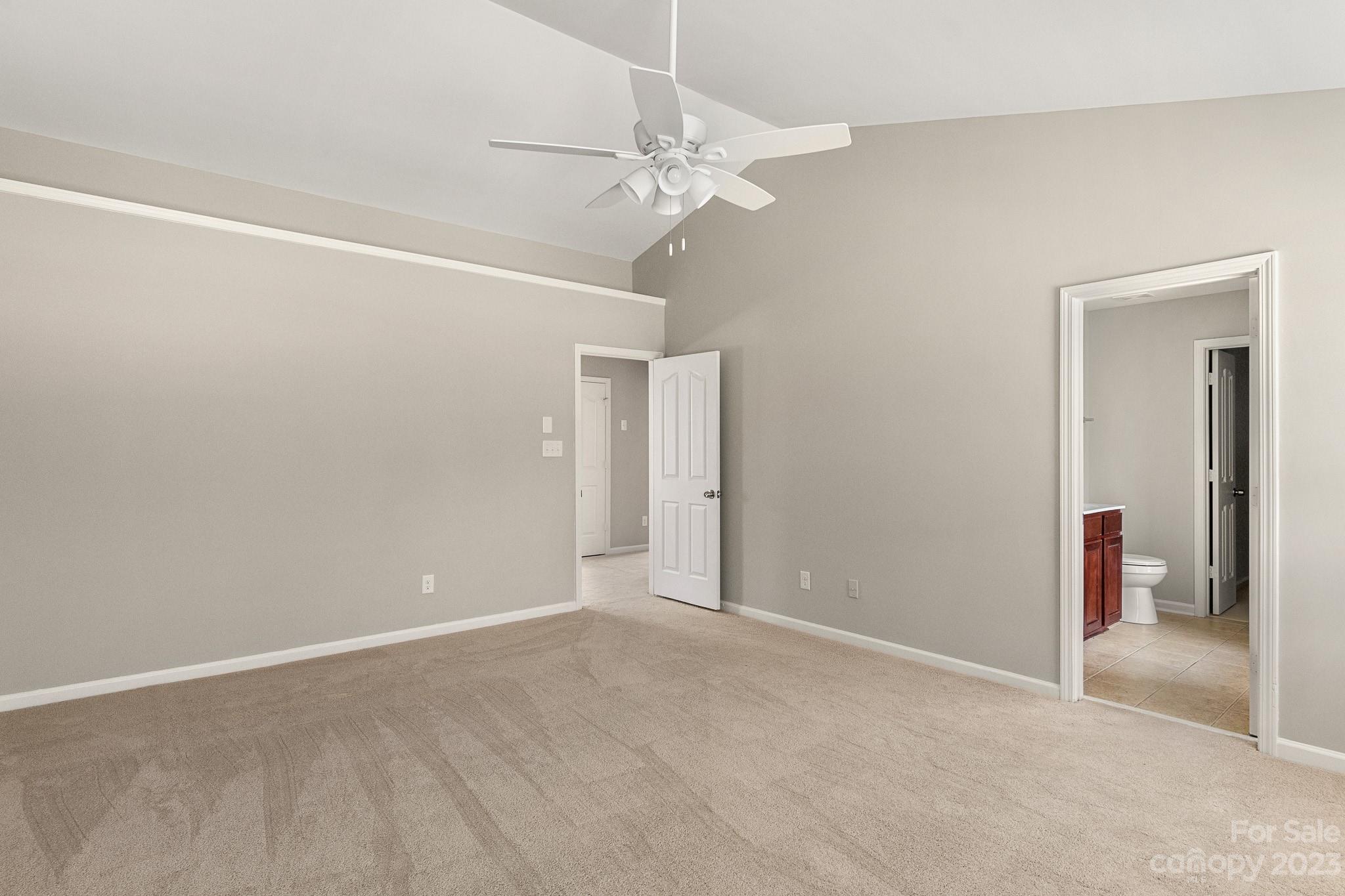 3808 Herkimer Drive Monroe, NC 28110 - Photo 29 of 40 a view of an empty room with a chandelier fan