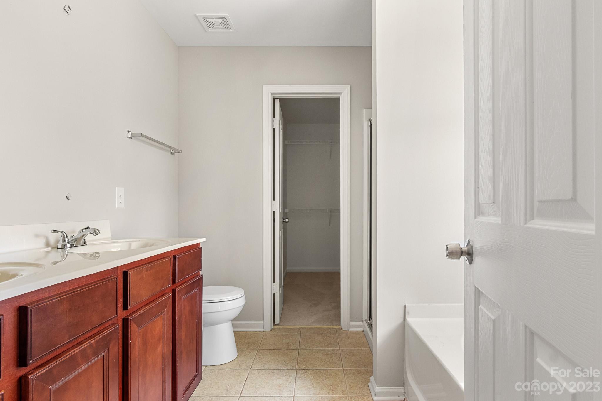 3808 Herkimer Drive Monroe, NC 28110 - Photo 34 of 40 a bathroom with a sink a toilet and shower
