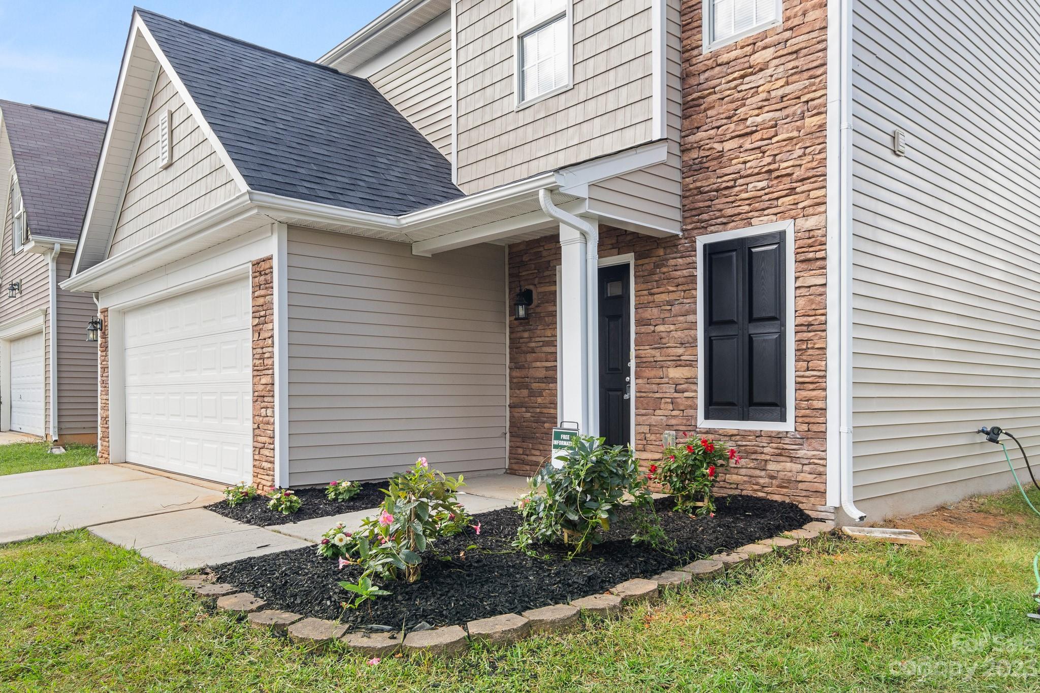 3808 Herkimer Drive Monroe, NC 28110 - Photo 36 of 40 a front view of a house with garden