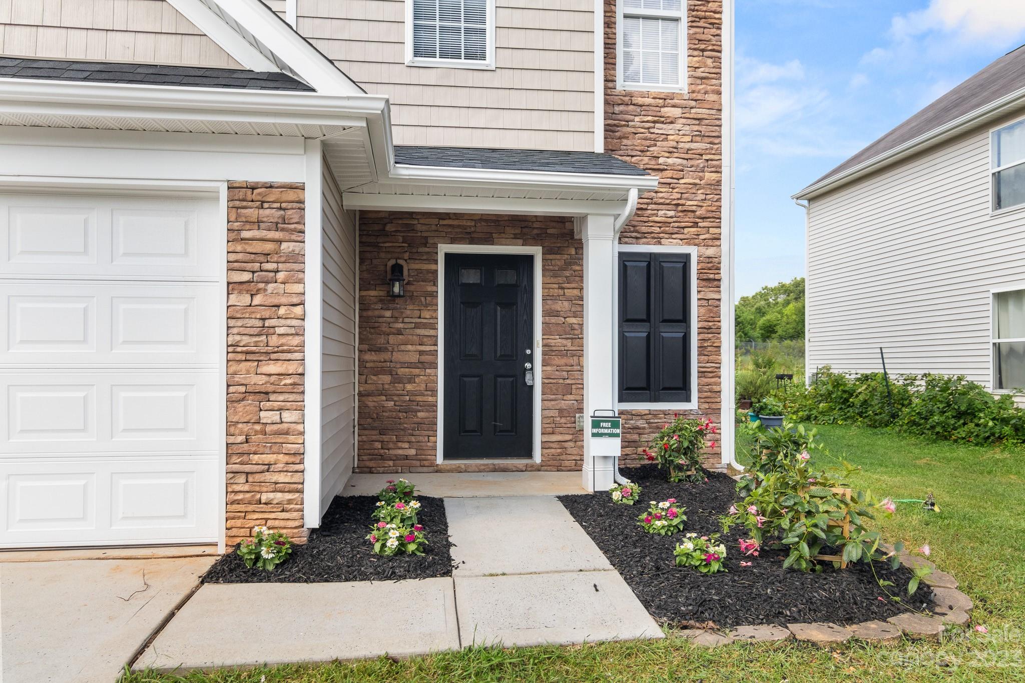 3808 Herkimer Drive Monroe, NC 28110 - Photo 39 of 40 a front view of a house with garden