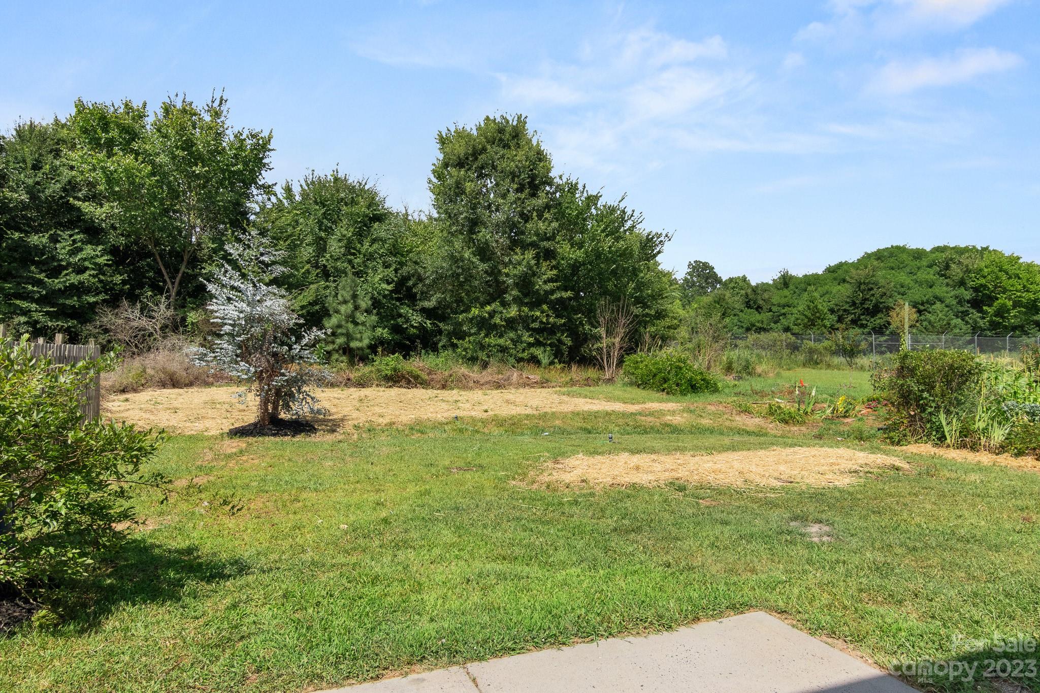3808 Herkimer Drive Monroe, NC 28110 - Photo 40 of 40 a swimming pool with wooden fence