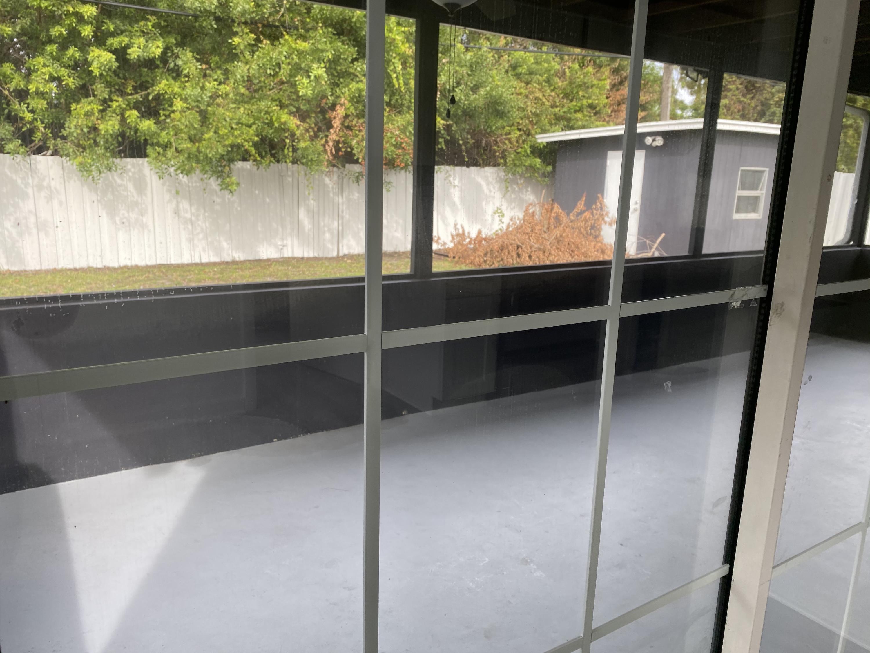 9319 Southwest 1st Place Boca Raton, FL 33428 - Photo 12 of 15 INSIDE VIEW OF PATIO