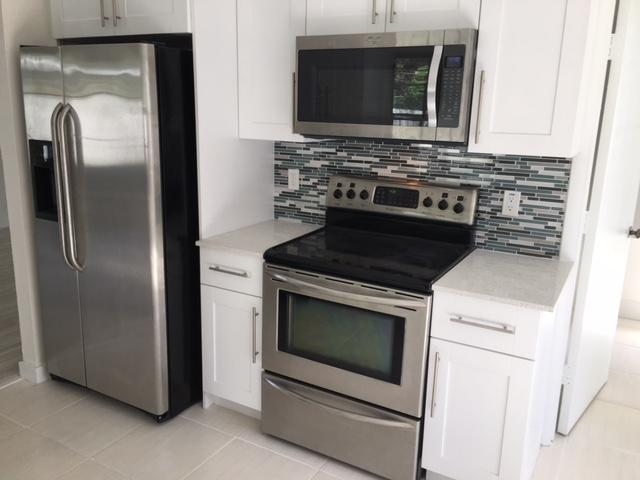 9319 Southwest 1st Place Boca Raton, FL 33428 - Photo 4 of 15 KITCHEN W