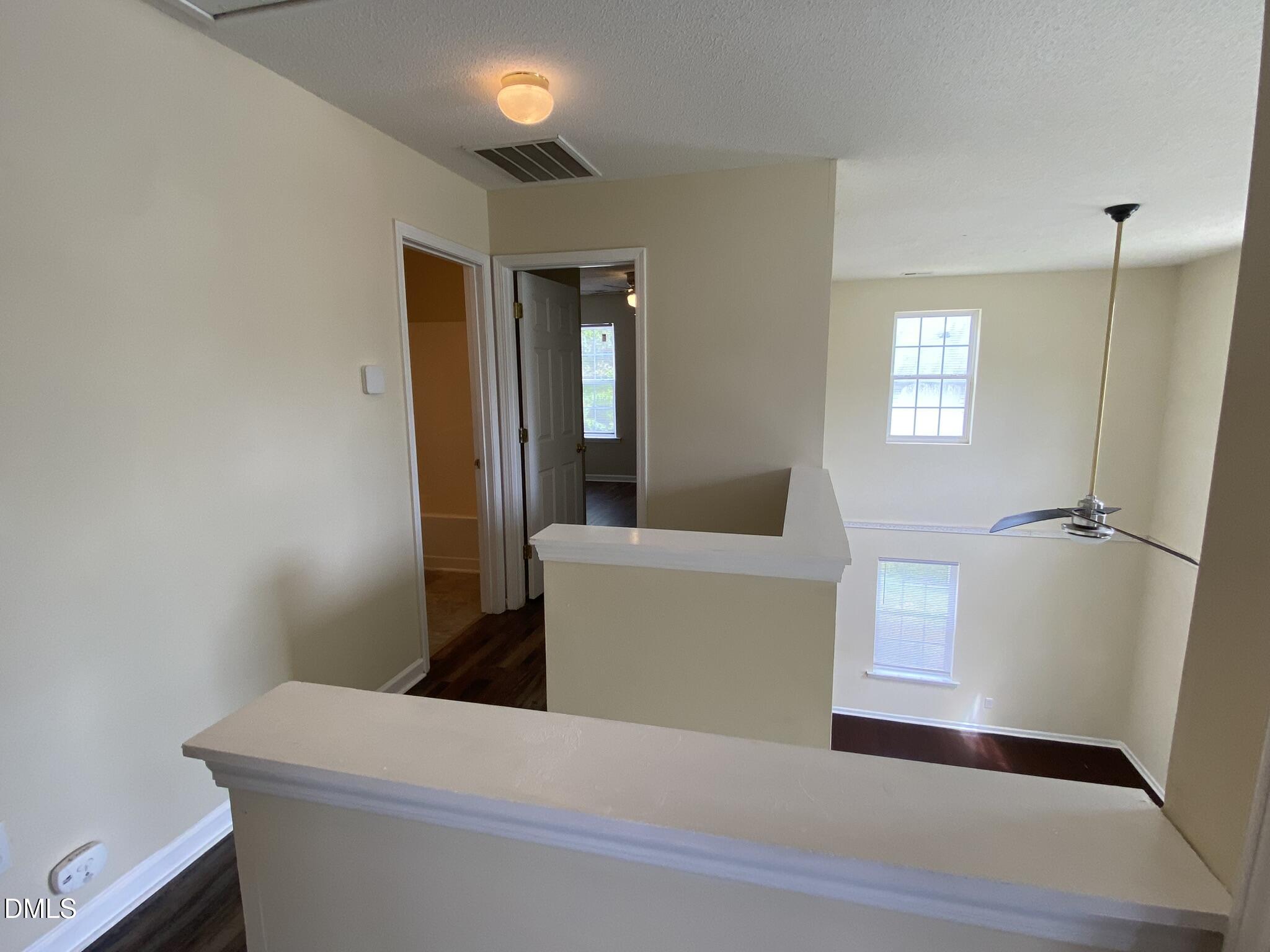5815 Ricker Road Raleigh, NC 27610 - Photo 16 of 19 a living room with a furniture and a window