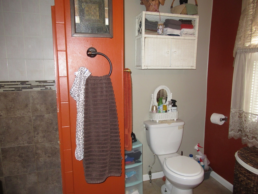 266 Palmer Road Monson, MA 01057 - Photo 16 of 40 a bathroom with a toilet sink and mirror