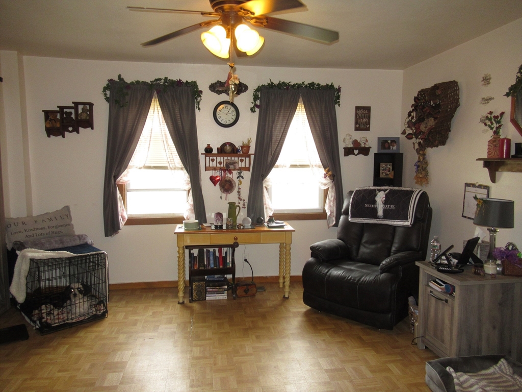 266 Palmer Road Monson, MA 01057 - Photo 17 of 40 a living room with furniture and a window