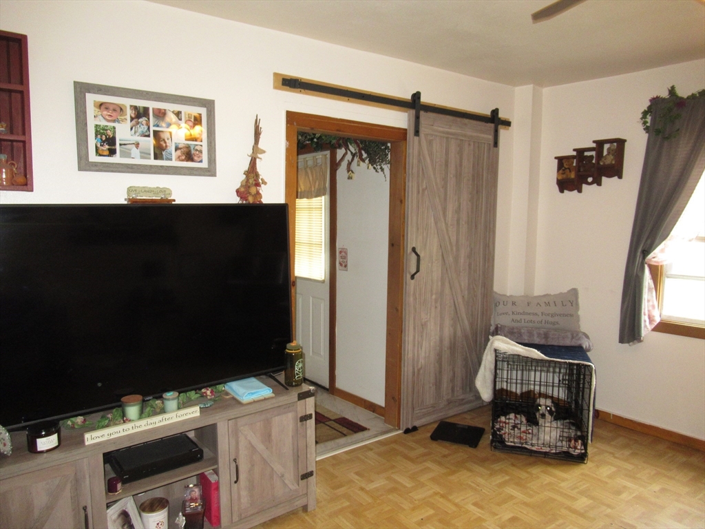 266 Palmer Road Monson, MA 01057 - Photo 18 of 40 a bedroom with a bed and a window