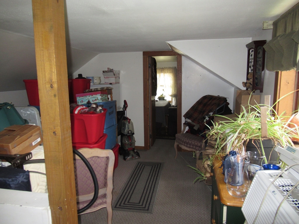 266 Palmer Road Monson, MA 01057 - Photo 22 of 40 a view of living room kitchen and utility room