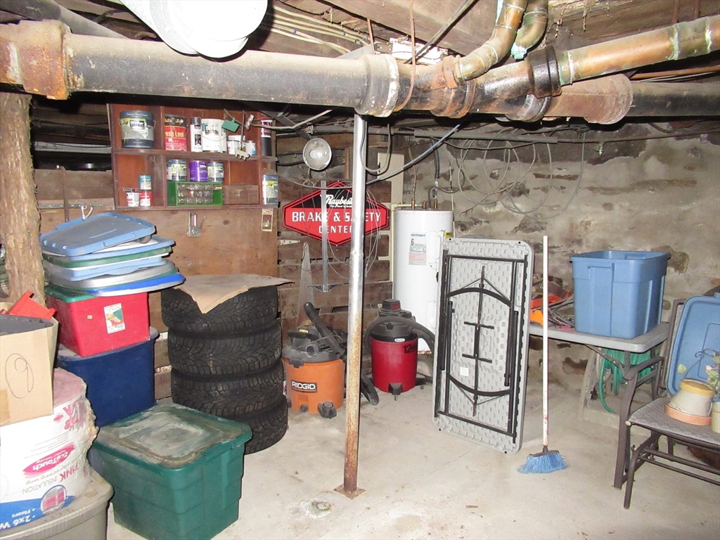 266 Palmer Road Monson, MA 01057 - Photo 29 of 40 a storage room with furniture