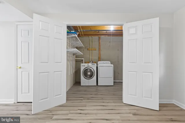 a utility room with dryer and washer