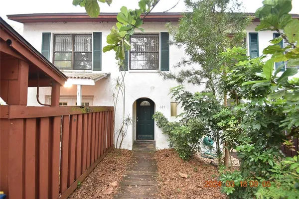 a view of entrance gate of a house