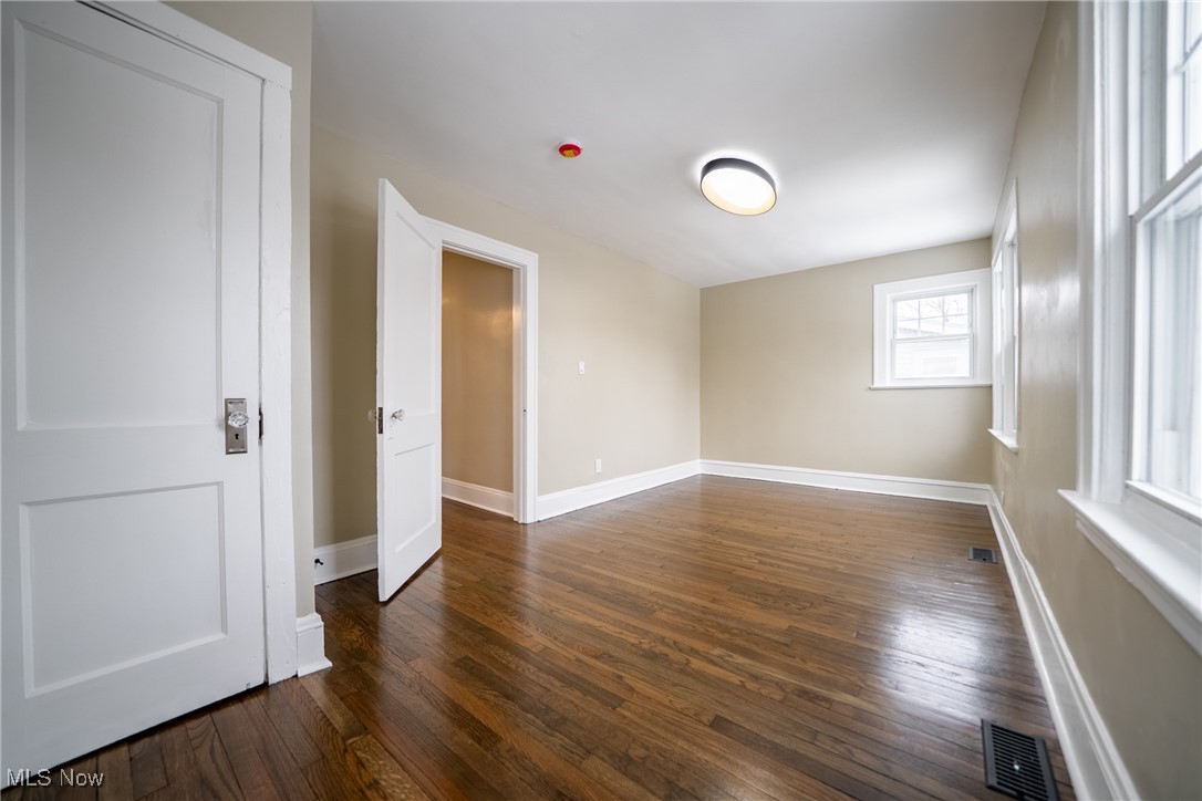 3816 Summit Park Road Cleveland Heights, OH 44121 - Photo 20 of 35 Unfurnished room with dark wood finished floors and baseboards