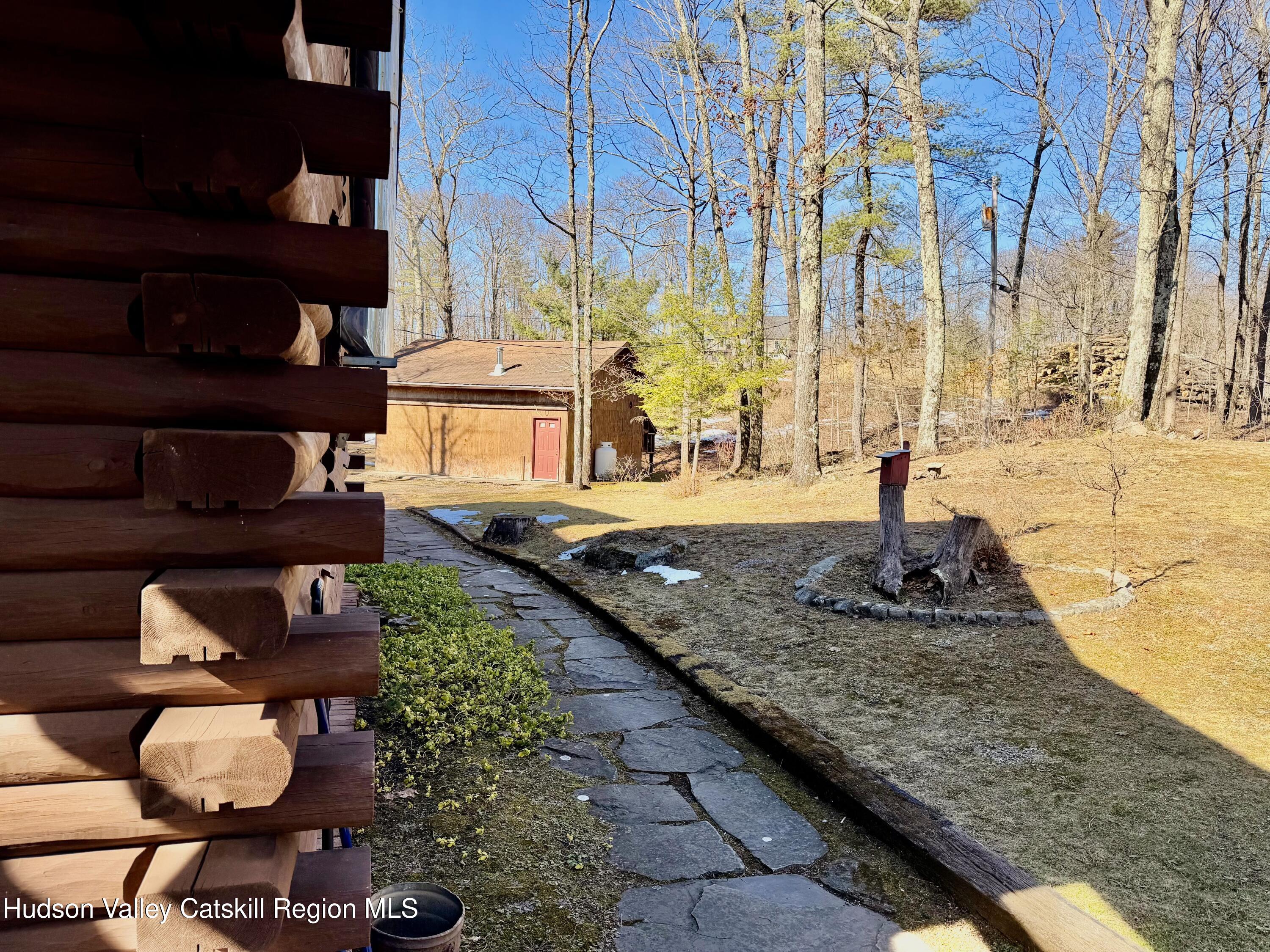 380 Easy Street Catskill, NY 12414 - Photo 12 of 57 a backyard of a house with barbeque oven