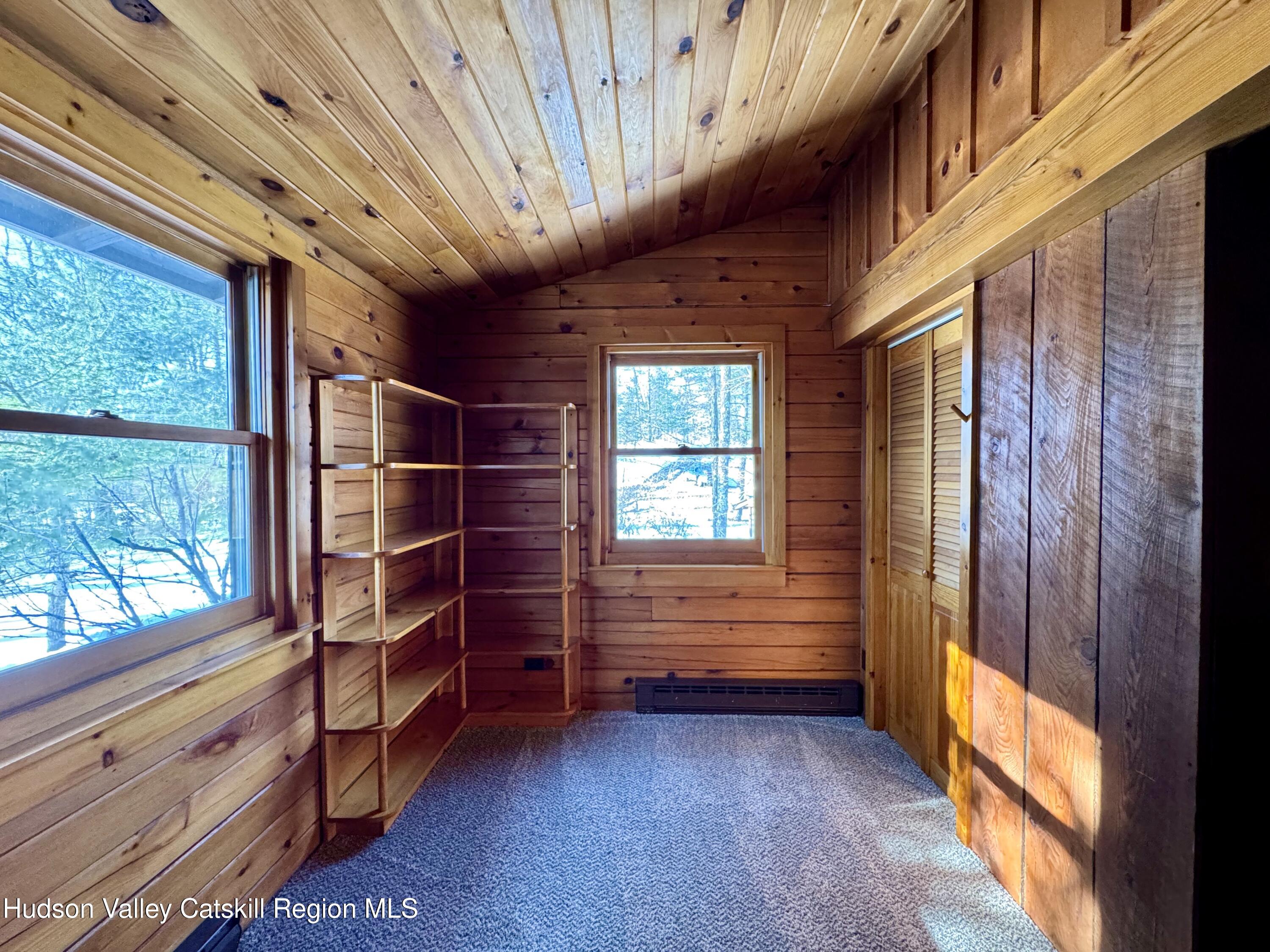 380 Easy Street Catskill, NY 12414 - Photo 29 of 57 a view of room with window and wooden floor