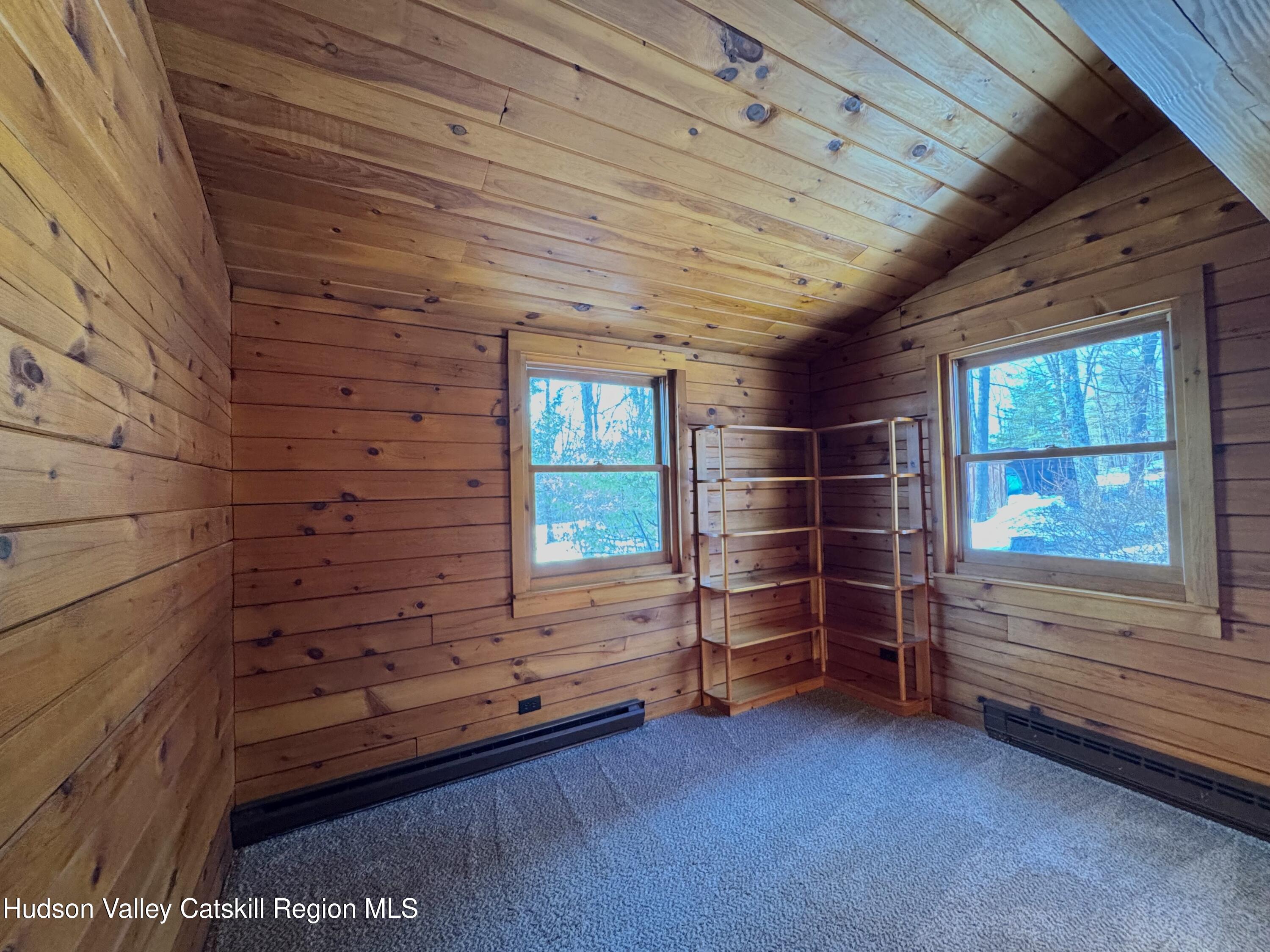 380 Easy Street Catskill, NY 12414 - Photo 30 of 57 a view of an empty room with furniture and window
