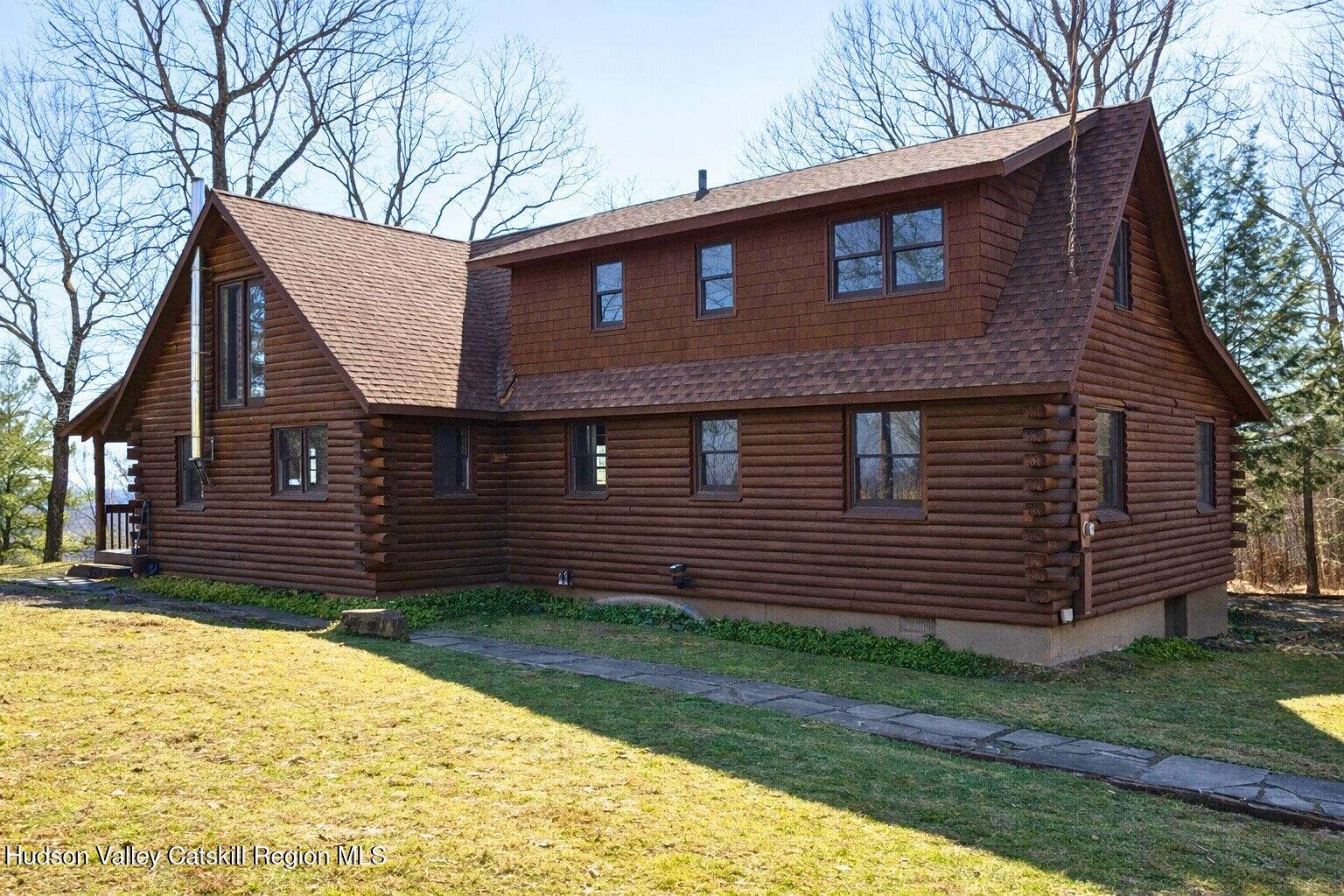380 Easy Street Catskill, NY 12414 - Photo 4 of 57 a front view of a house with a yard