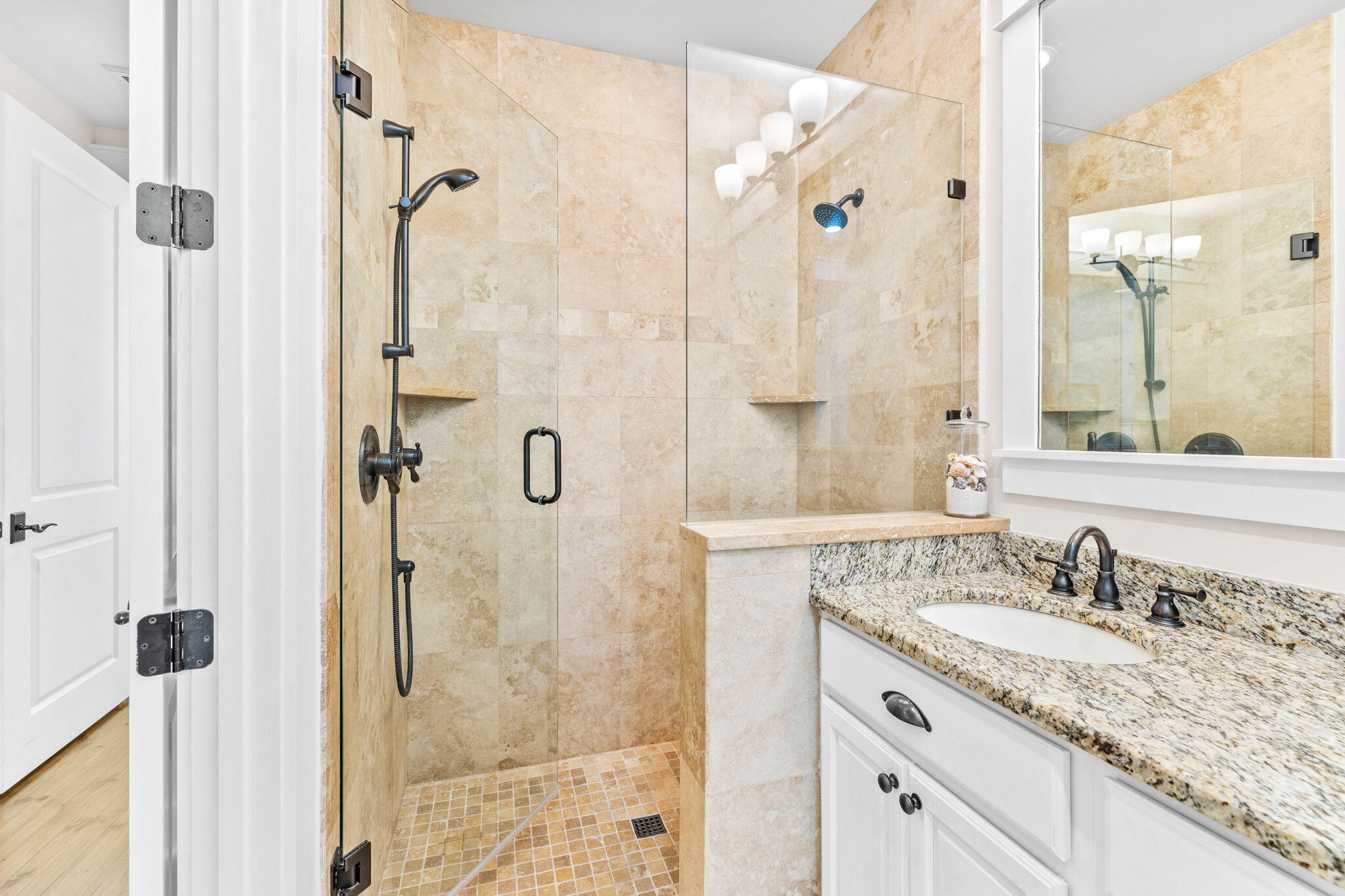 17 Red Basil Drive Santa Rosa Beach, FL 32459 - Photo 28 of 59 a bathroom with a granite countertop shower sink vanity and mirror