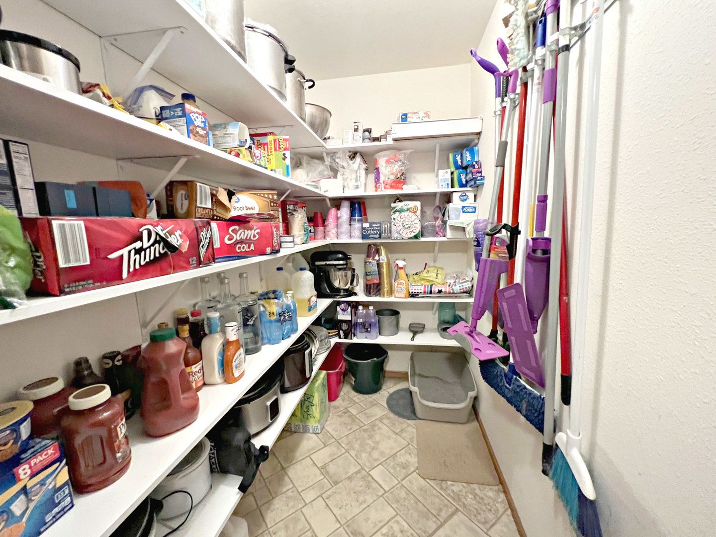 14508 Nichols Road Hebron, IL 60034 - Photo 11 of 38 a utility room with lots of clutter and refrigerator