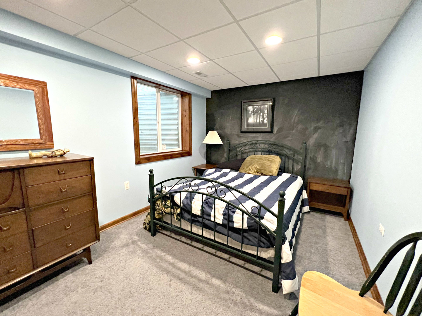 14508 Nichols Road Hebron, IL 60034 - Photo 21 of 38 a bedroom with a bed and a dresser