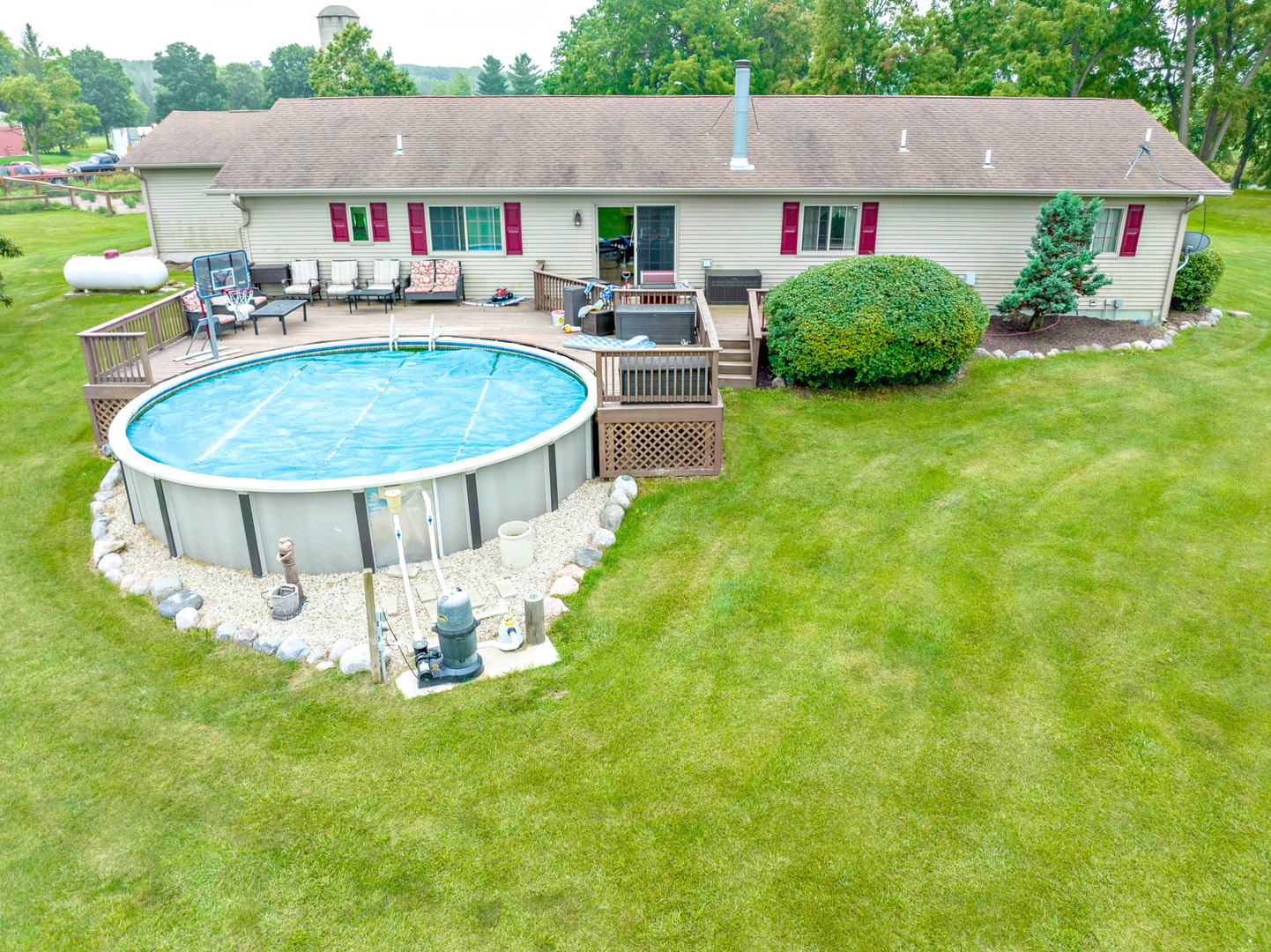 14508 Nichols Road Hebron, IL 60034 - Photo 32 of 38 a view of house with swimming pool and furniture