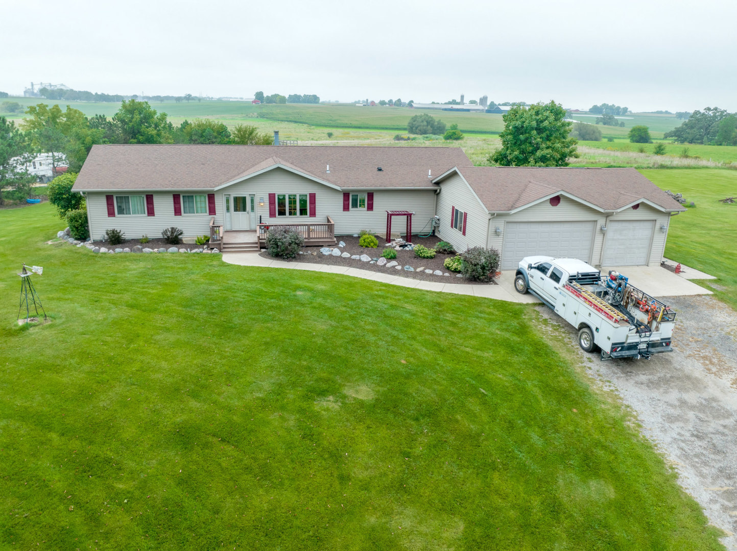 14508 Nichols Road Hebron, IL 60034 - Photo 38 of 38 a aerial view of a house with swimming pool and garden