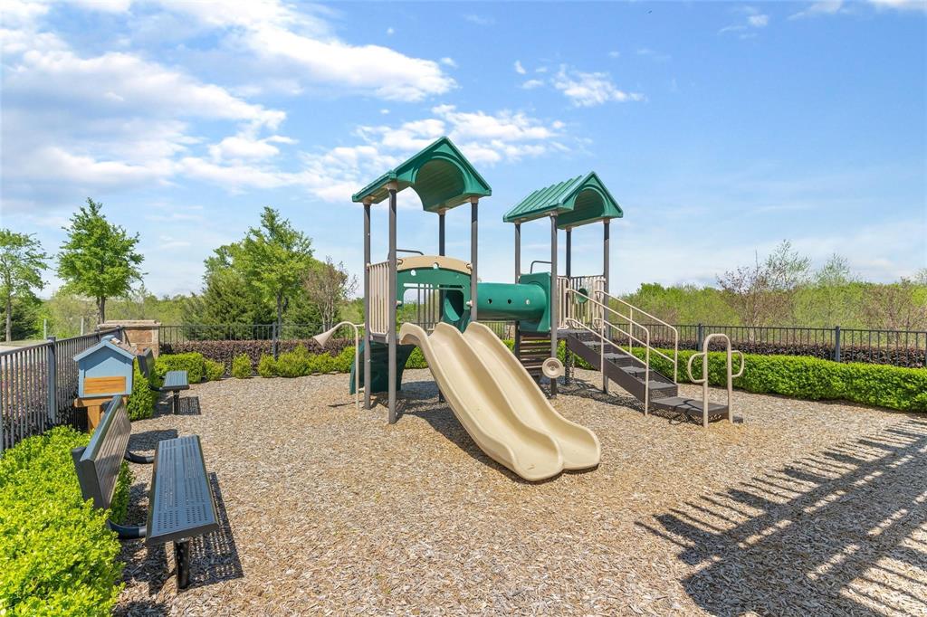 a view of a park with a slide