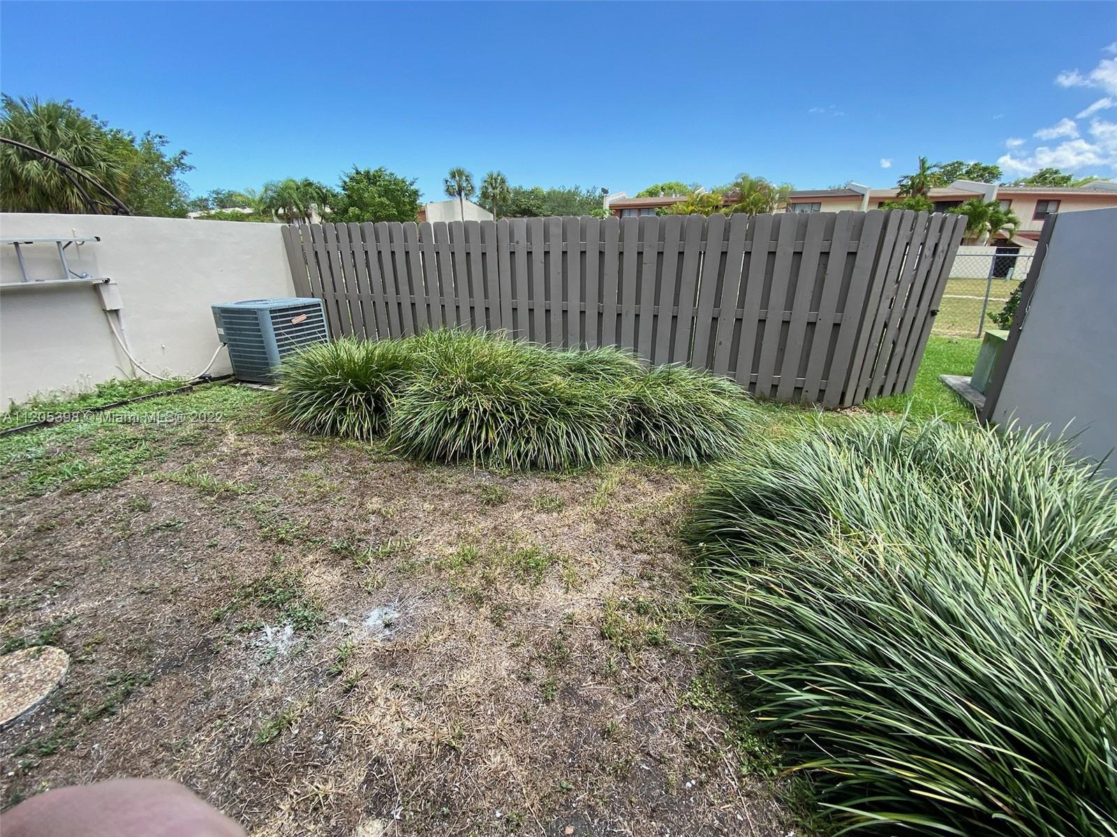 10478 Southwest 75th Lane Miami, FL 33173 - Photo 5 of 45 a view of a backyard with plants
