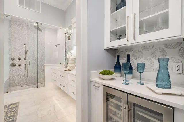 a view of a balcony with two chairs and a table